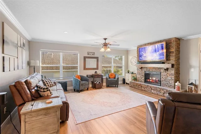 a bedroom with furniture and a fireplace