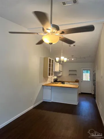a view of kitchen and chandelier
