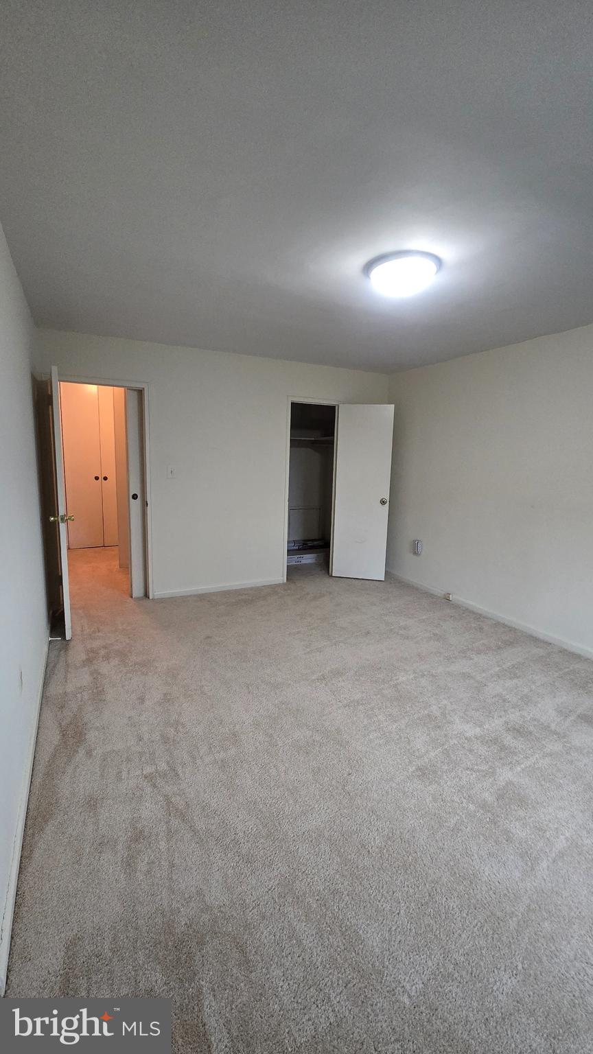 1200 South Arlington Ridge Road, Unit 403 Arlington, VA 22202 - Photo 15 of 19 Primary bedroom with walk-in closet