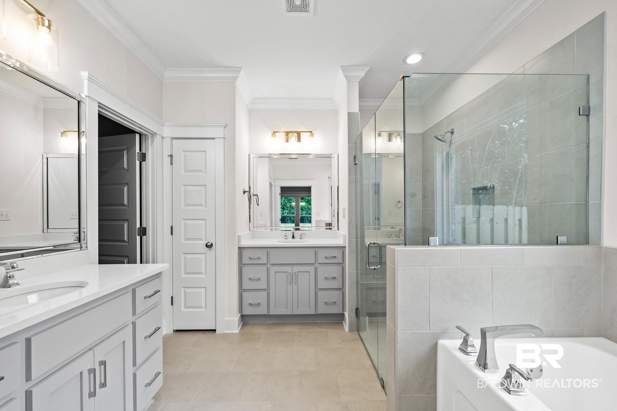 29 Signal Hill Road Daphne, AL 36527 - Photo 21 of 36 Bathroom featuring tile patterned flooring, independent shower and bath, ornamental molding, and vanity