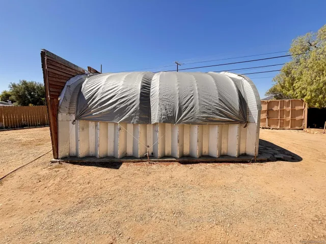 a view of wooden floor in front of house