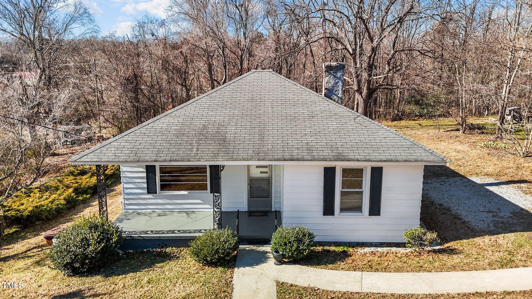1413 Longhurst Street Roxboro, NC 27573 - Photo 2 of 47 2-web-or-mls-DJI_20250108120641_0029_D