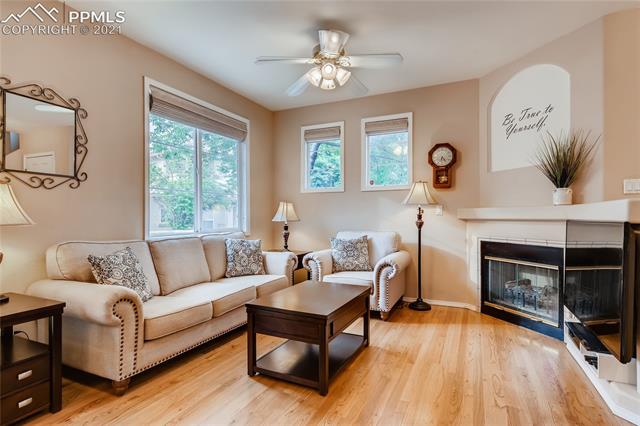 3207 Atrium Point Colorado Springs, CO 80906 - Photo 5 of 27 Family room with gas fireplace!