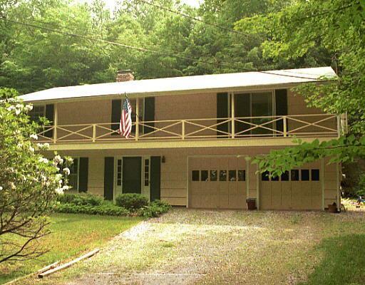 220 Branch Brook Road Wilton, CT 06897 - Photo 1 of 1 a view of a house with a outdoor space