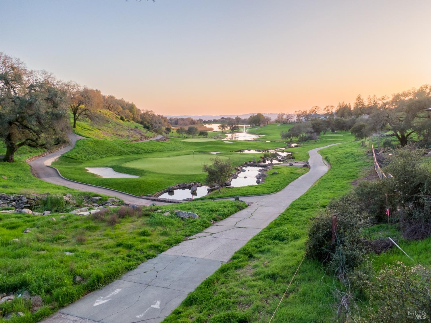 3703 Llyn Glaslyn Place Santa Rosa, CA 95403 - Photo 22 of 29 a view of a grassy field with grassy area