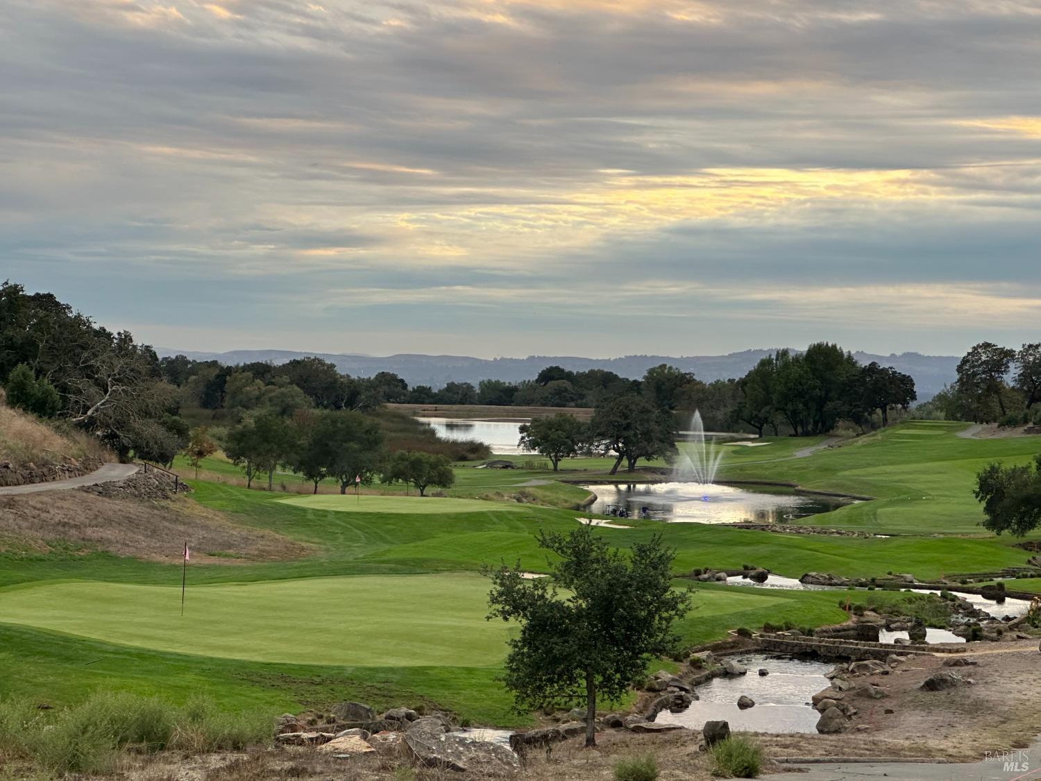 3703 Llyn Glaslyn Place Santa Rosa, CA 95403 - Photo 3 of 29 a view of a golf course with a garden