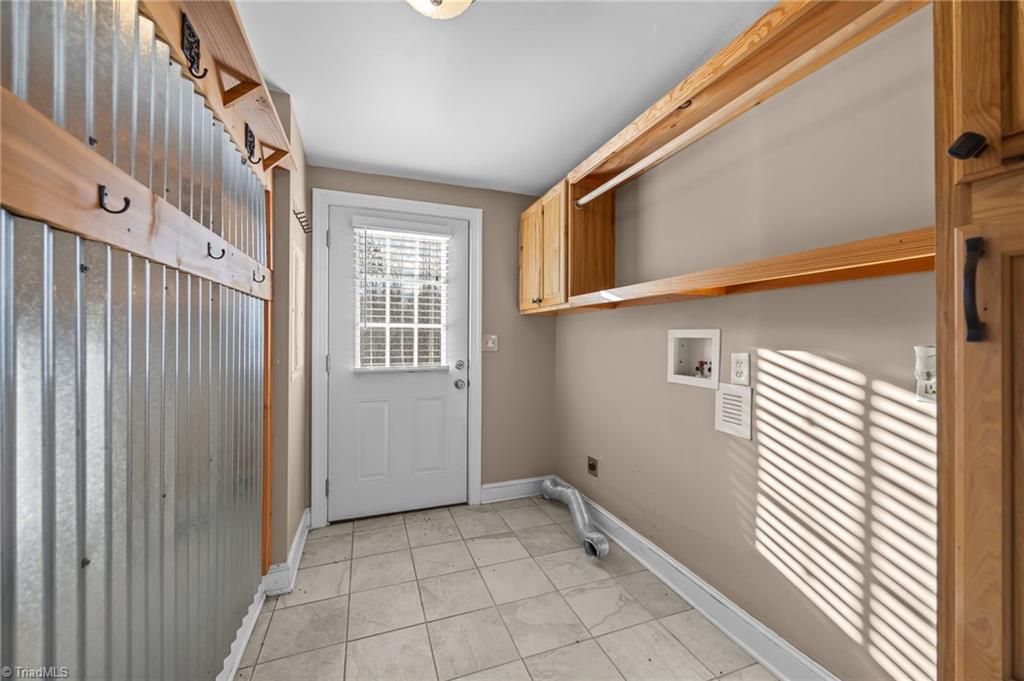 950 Waggoner Neal Road Walkertown, NC 27051 - Photo 30 of 48 Laundry room and a second doorway to get to the back.