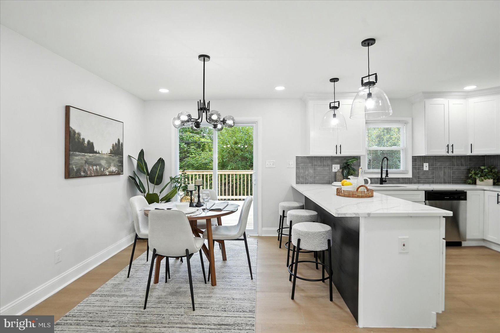 7031 Glen Spring Road Baltimore, MD 21244 - Photo 9 of 43 a view of a dining room with furniture window and outside view
