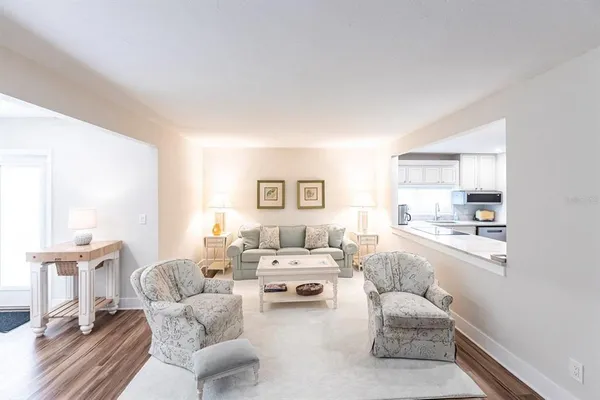 a living room with furniture and a table