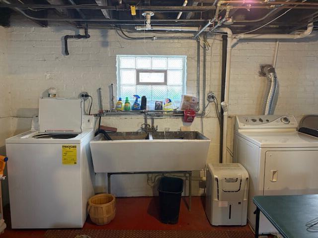 1726 Davis Avenue Whiting, IN 46394 - Photo 31 of 40 a view of washer and dryer with bathroom in the background