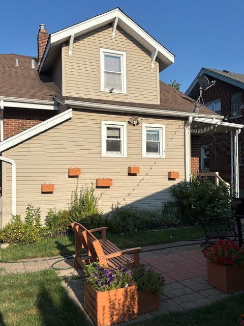 1726 Davis Avenue Whiting, IN 46394 - Photo 37 of 40 a view of a house with backyard and garden