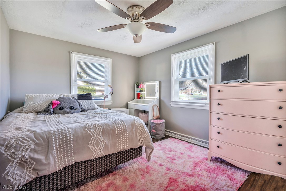 6116 Melody Road Northeast Canton, OH 44721 - Photo 18 of 33 Bedroom featuring ceiling fan and wood finished floors