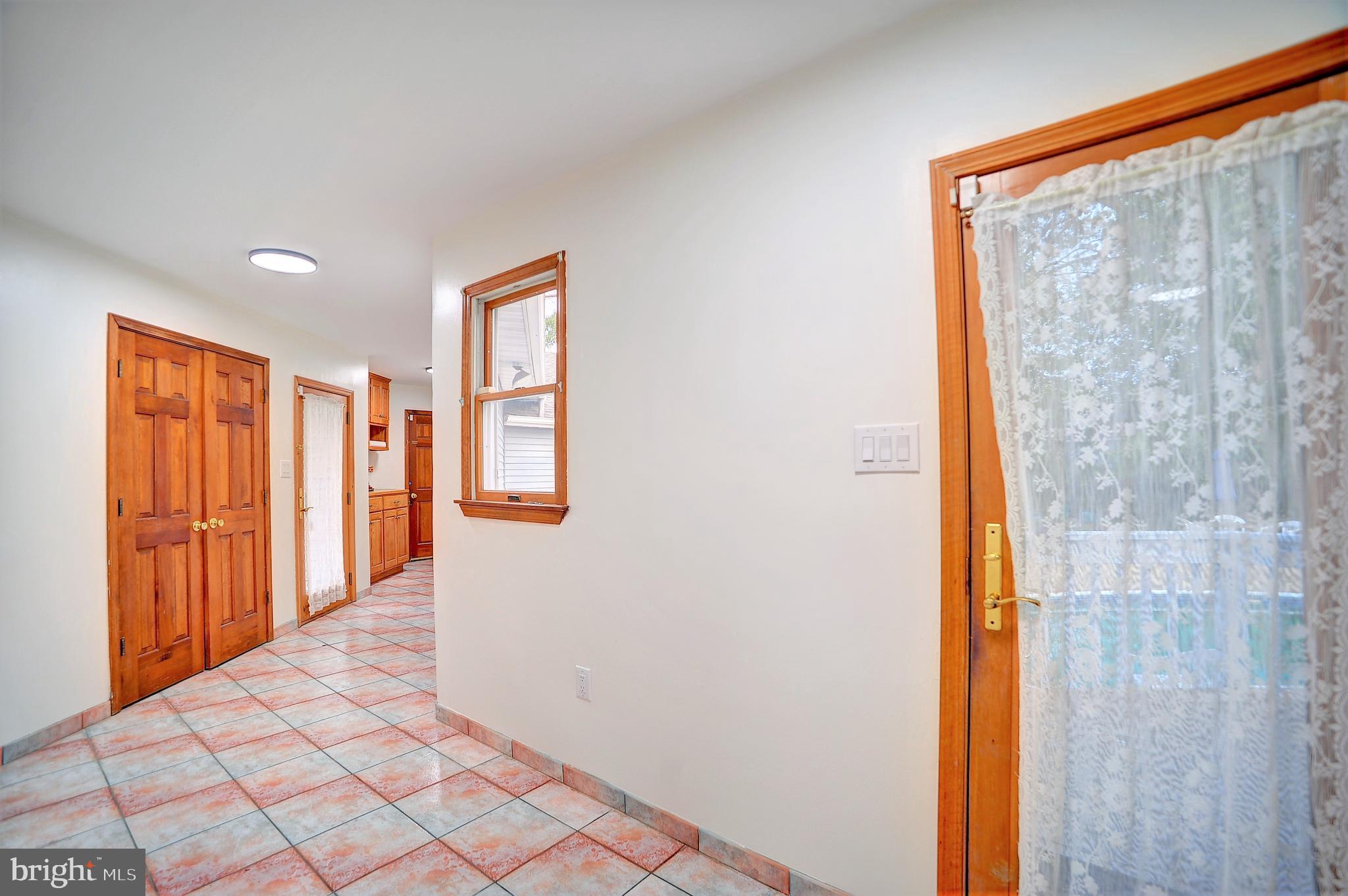 705 Princeton Road Lanoka Harbor, NJ 08734 - Photo 123 of 141 Hallway from garage to main house
