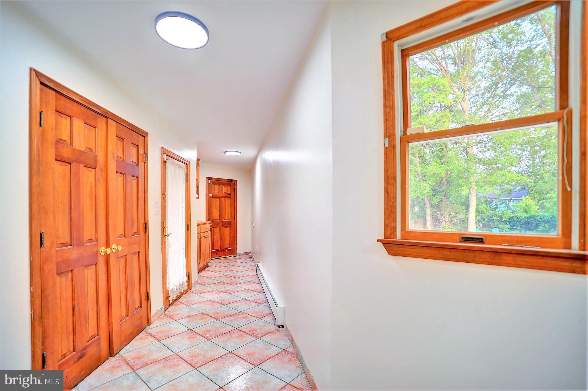 705 Princeton Road Lanoka Harbor, NJ 08734 - Photo 124 of 141 Hallway from garage to main house