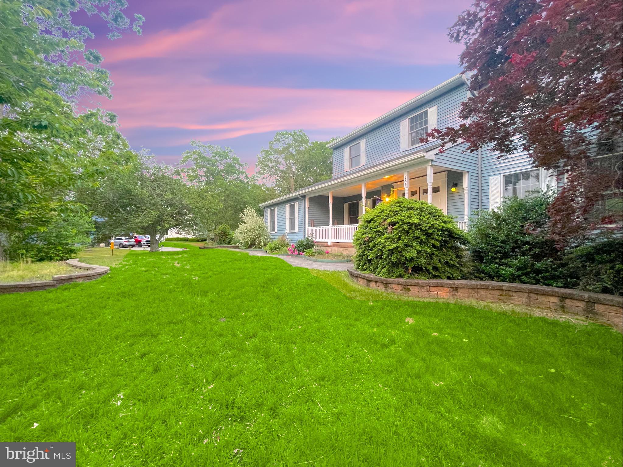 705 Princeton Road Lanoka Harbor, NJ 08734 - Photo 130 of 141 a front view of a house with garden