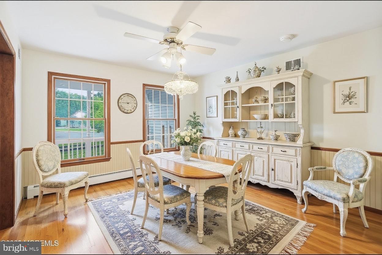 705 Princeton Road Lanoka Harbor, NJ 08734 - Photo 15 of 141 a view of a dining room with furniture and wooden floor