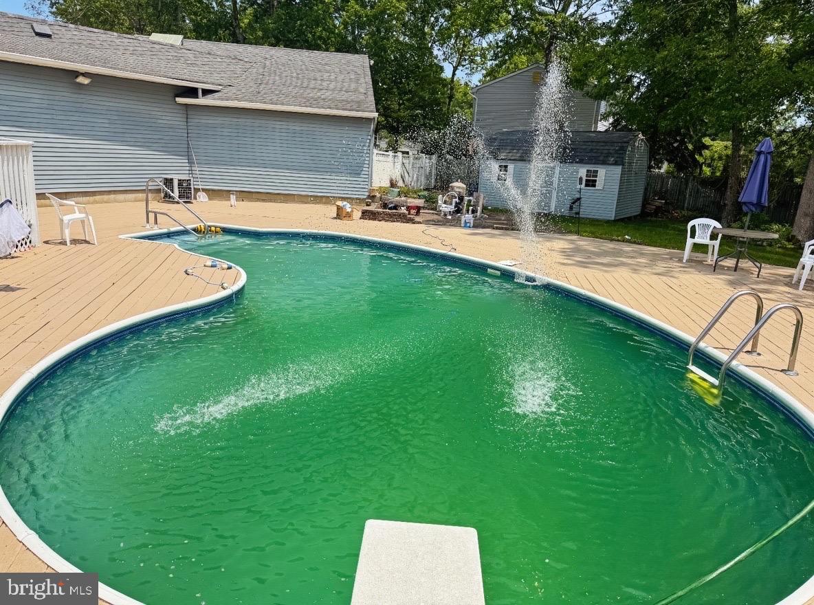 705 Princeton Road Lanoka Harbor, NJ 08734 - Photo 2 of 141 a view of a backyard with a sitting area
