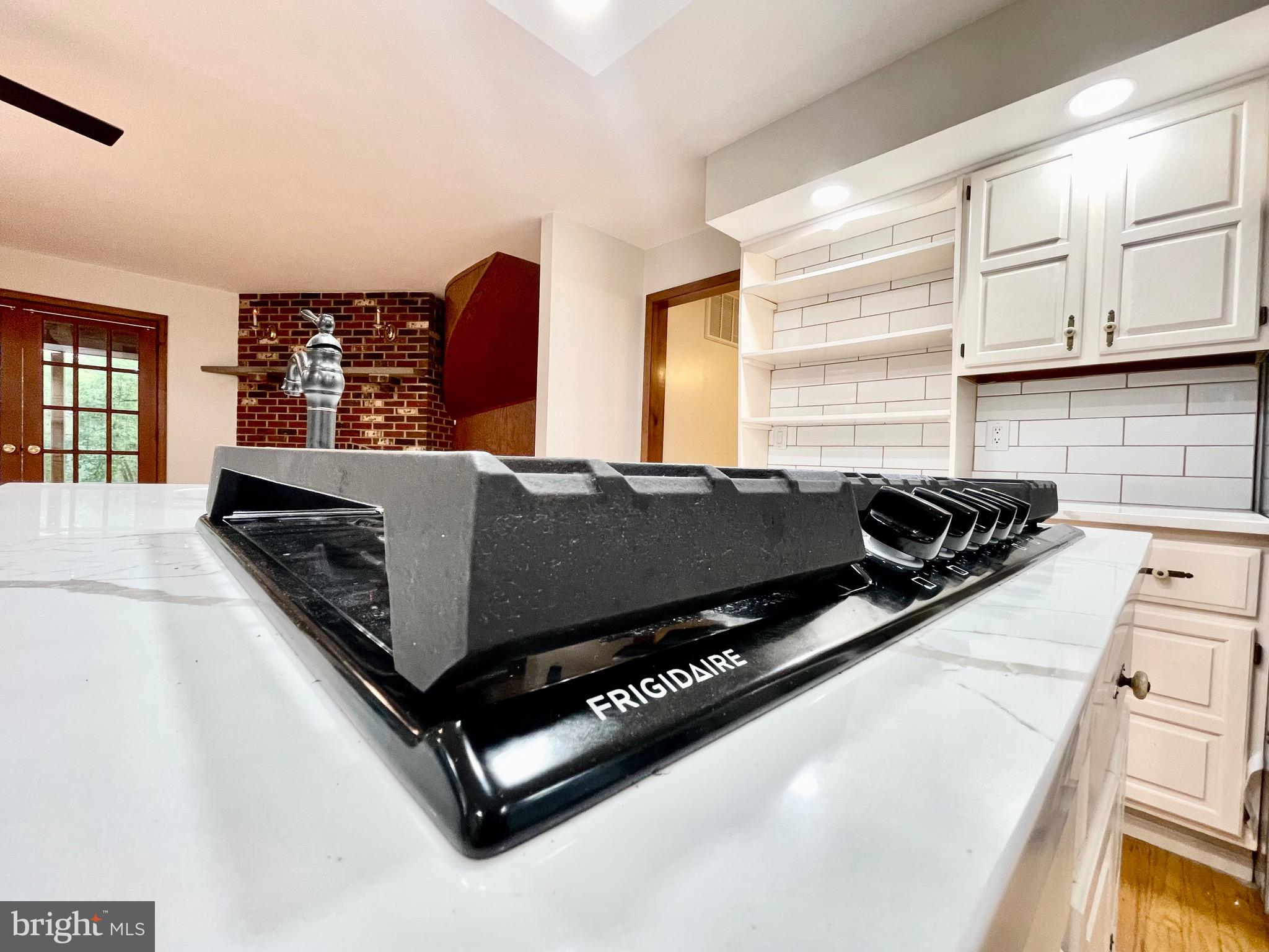 705 Princeton Road Lanoka Harbor, NJ 08734 - Photo 50 of 141 a bed sitting in a kitchen next to a window