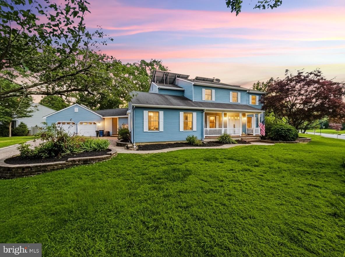 705 Princeton Road Lanoka Harbor, NJ 08734 - Photo 5 of 141 a front view of a house with a yard