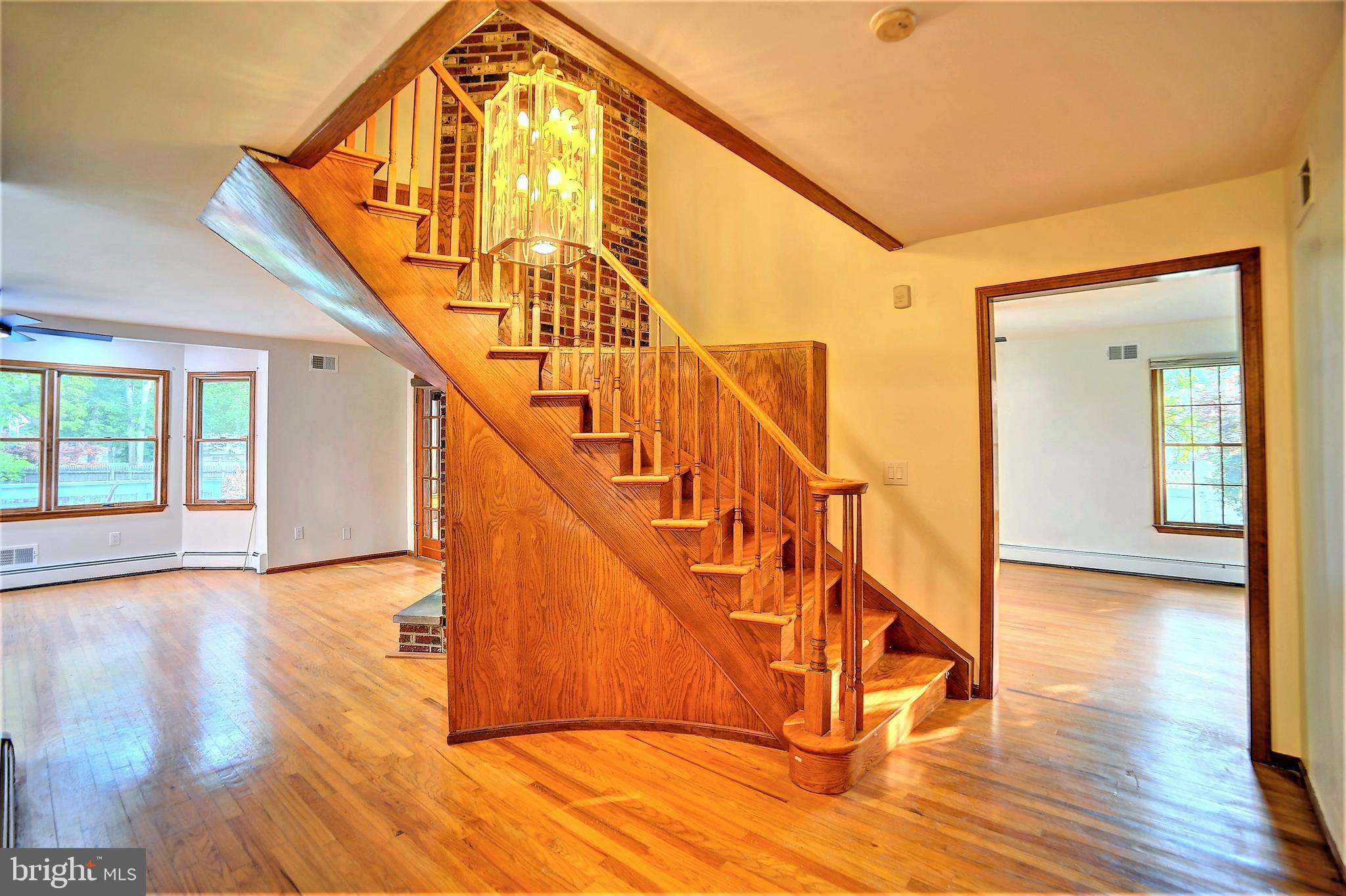 705 Princeton Road Lanoka Harbor, NJ 08734 - Photo 67 of 141 a view of entryway and hall with wooden floor