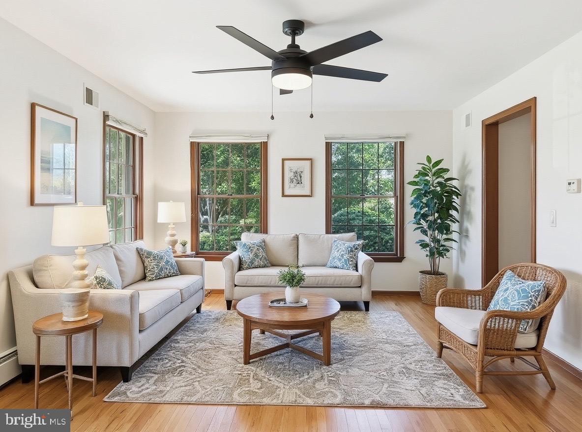 705 Princeton Road Lanoka Harbor, NJ 08734 - Photo 72 of 141 a living room with furniture potted plant and a large window
