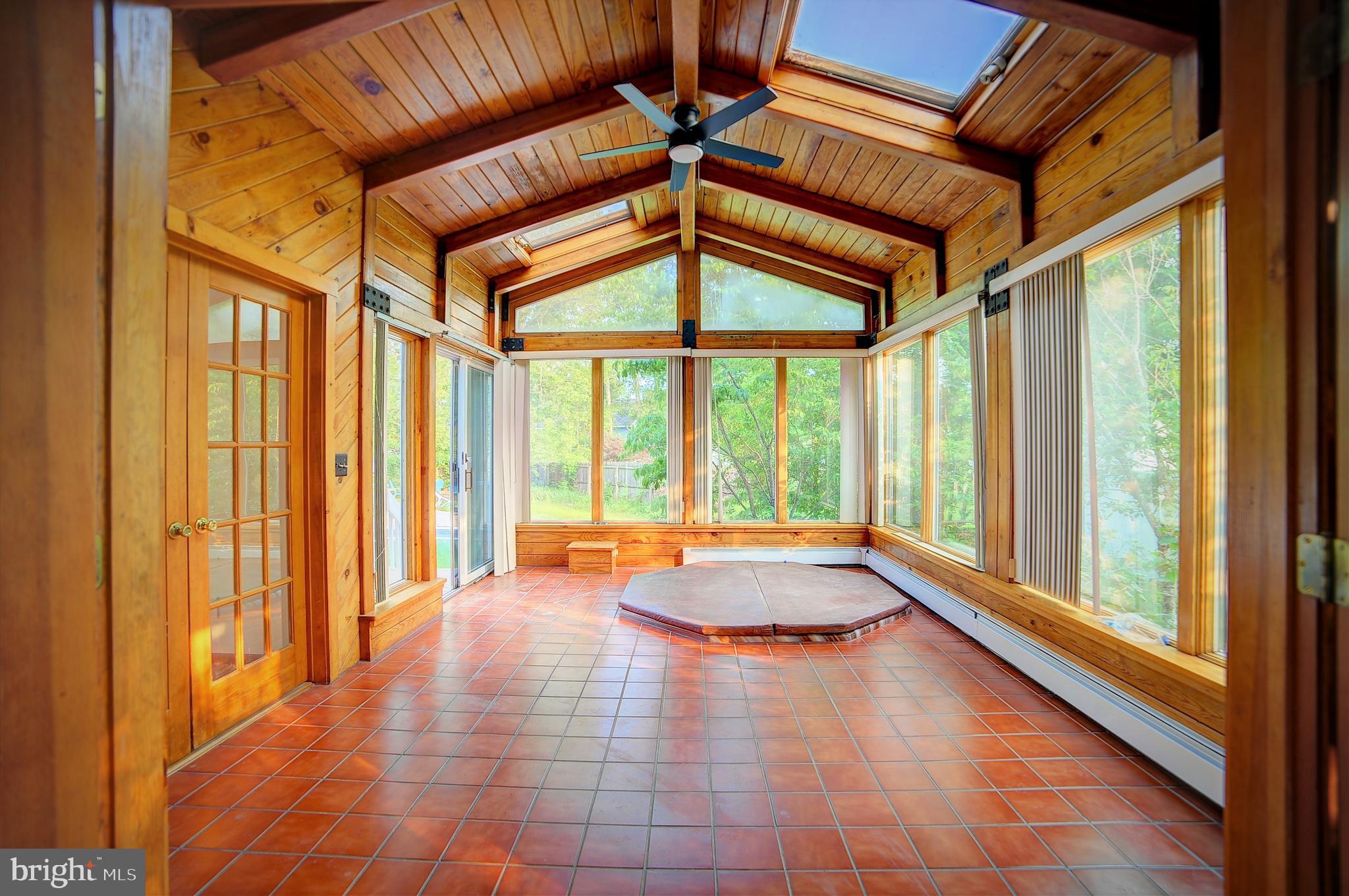 705 Princeton Road Lanoka Harbor, NJ 08734 - Photo 75 of 141 a view of an empty room with wooden floor and a window