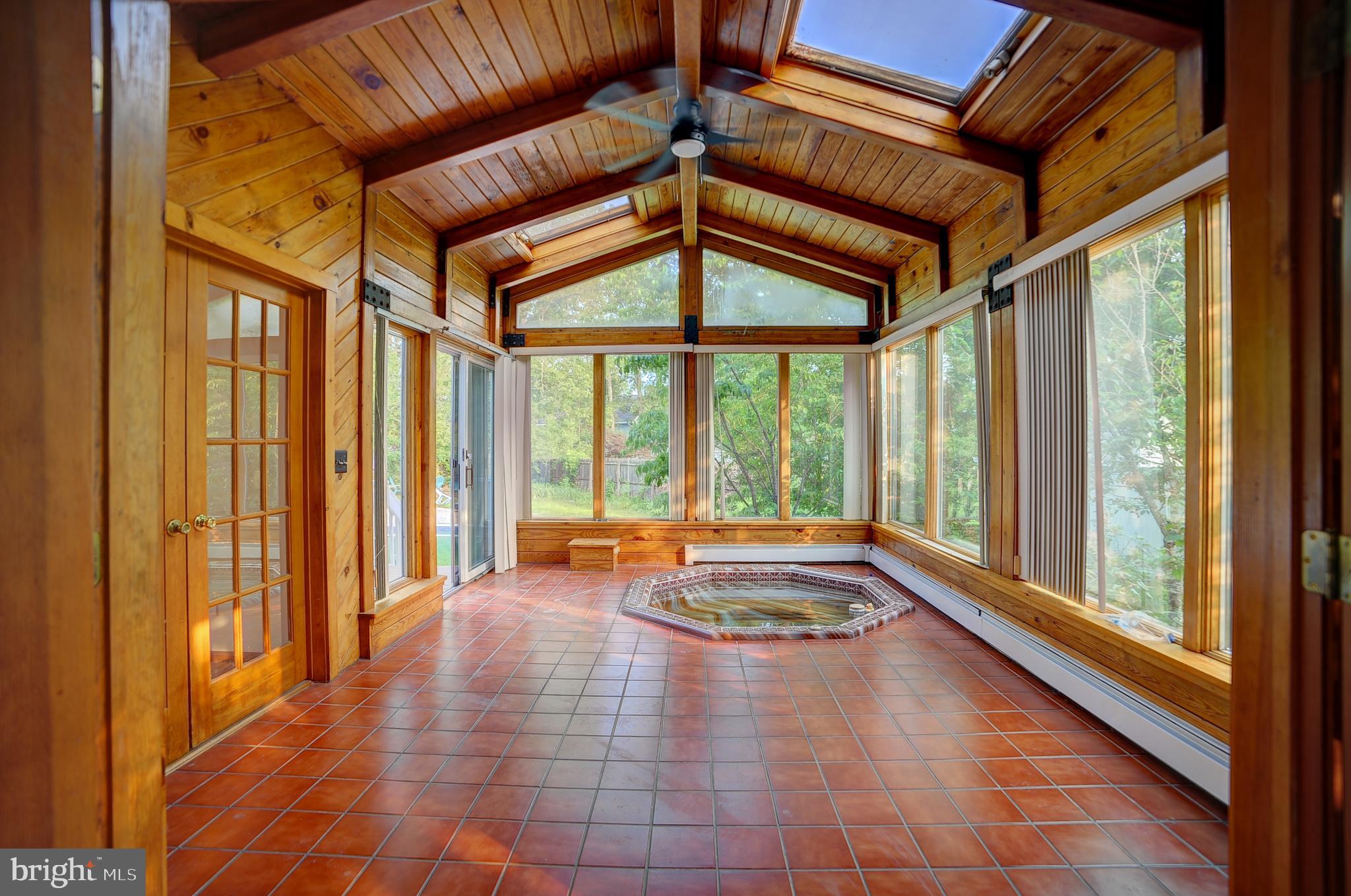 705 Princeton Road Lanoka Harbor, NJ 08734 - Photo 76 of 141 Solar room with wall wall windows