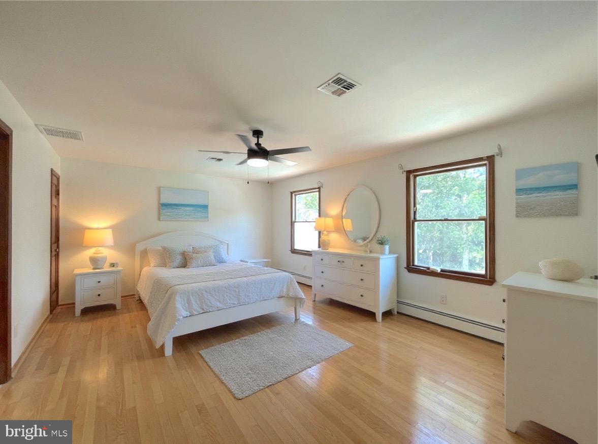 705 Princeton Road Lanoka Harbor, NJ 08734 - Photo 97 of 141 a bedroom with a bed and a large window