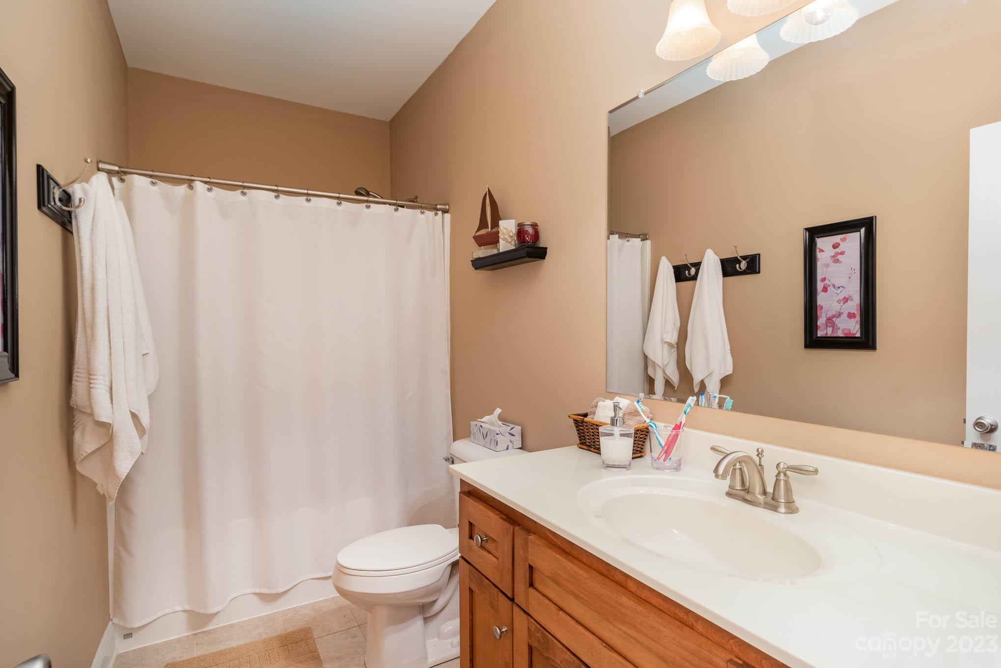 2255 South Paraham Road York, SC 29745 - Photo 21 of 33 a bathroom with a sink toilet and shower