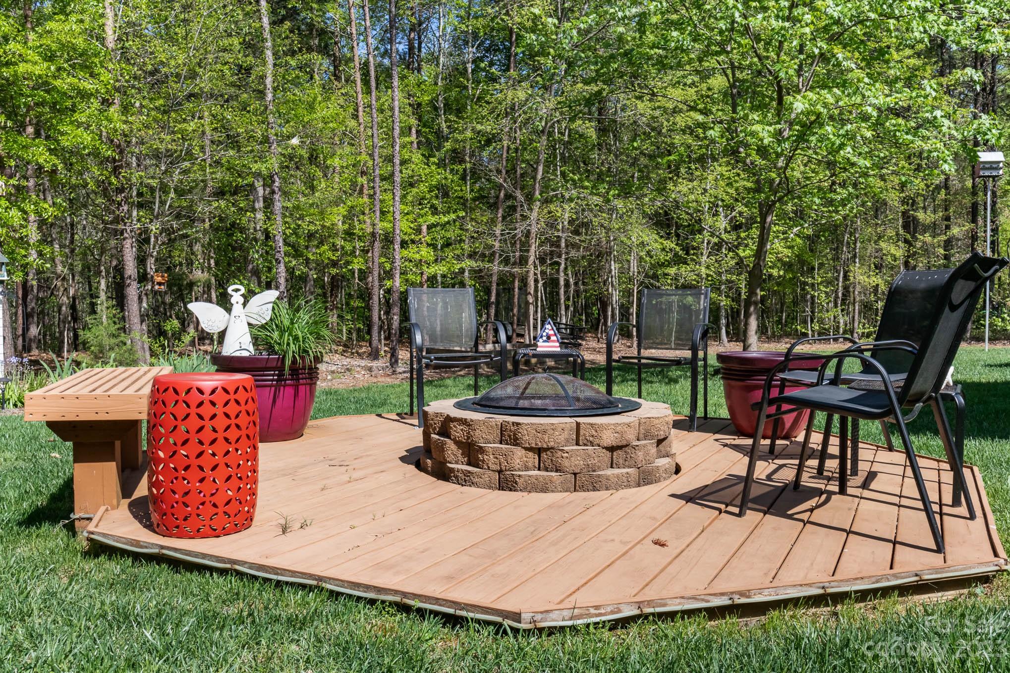 2255 South Paraham Road York, SC 29745 - Photo 30 of 33 a view of a backyard with plants and a patio