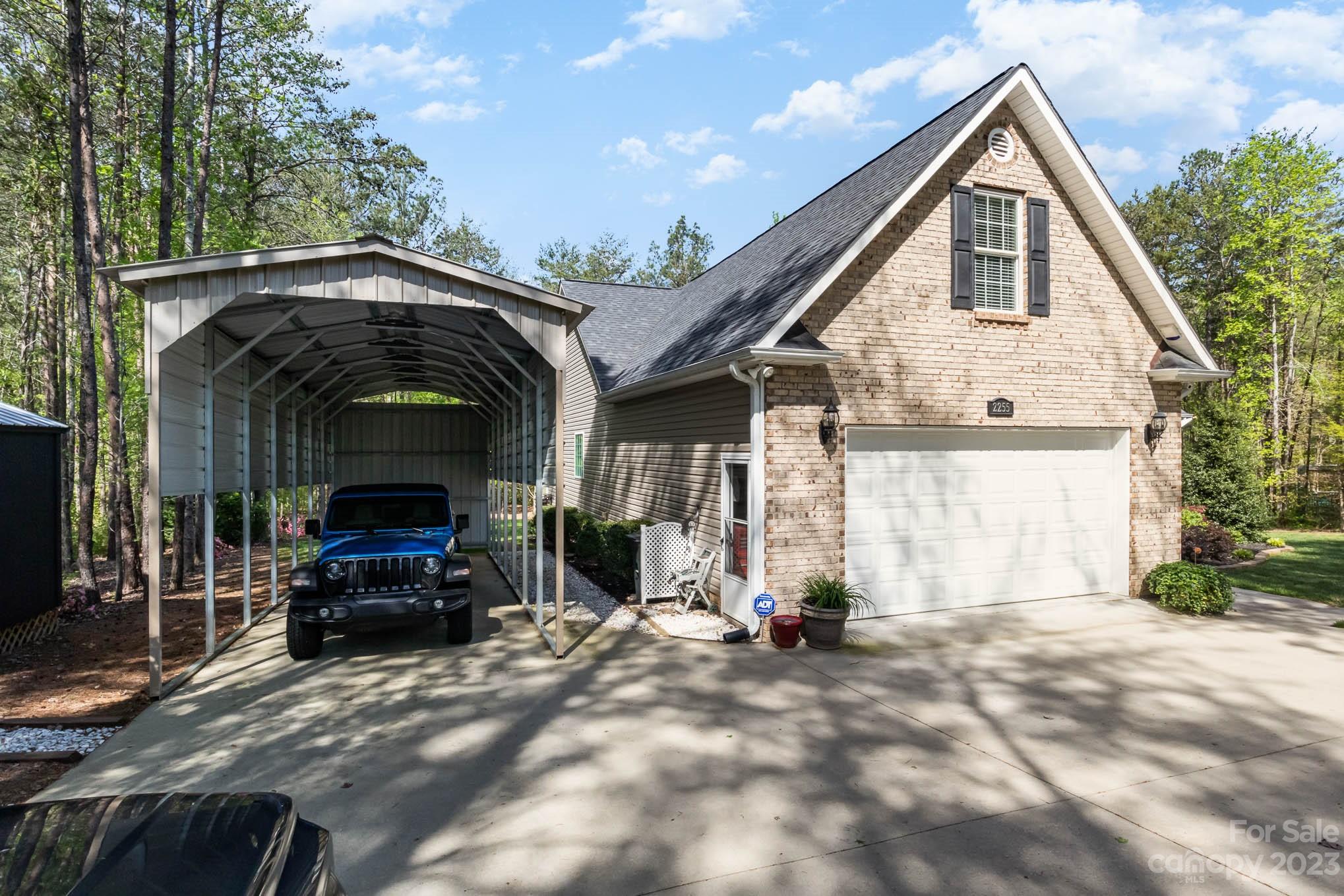 2255 South Paraham Road York, SC 29745 - Photo 3 of 33 a view of house and car parked in front of house