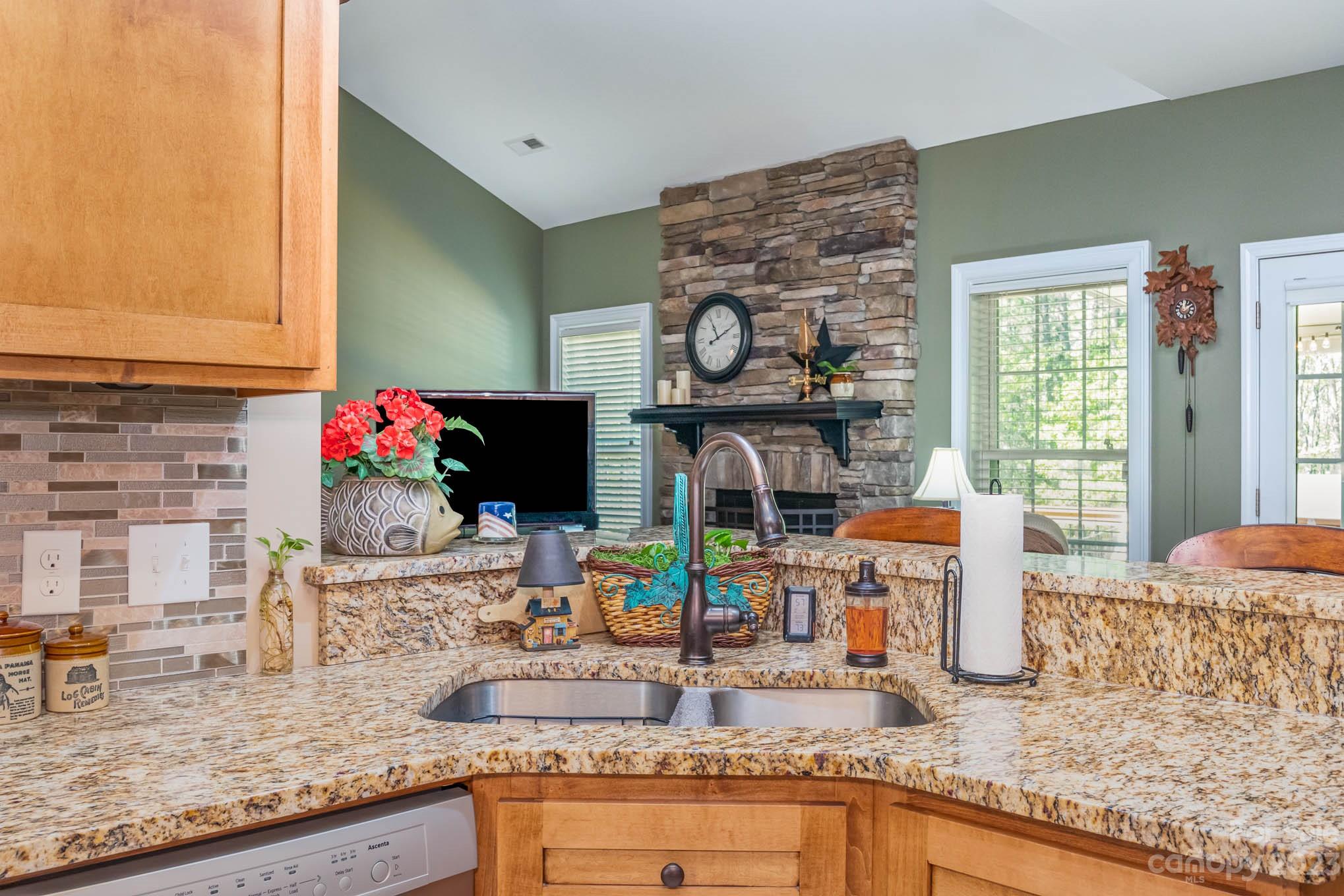 2255 South Paraham Road York, SC 29745 - Photo 8 of 33 a kitchen with granite countertop a sink and a stove