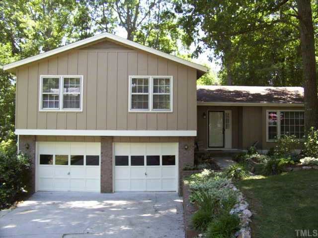 6616 Winding Trail Raleigh, NC 27612 - Photo 1 of 1 a front view of a house with a yard