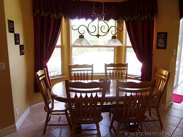 1909 Southwest Panther Trace Stuart, FL 34997 - Photo 11 of 25 Other. Breakfast nook overlooks tropical pool area