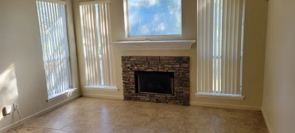 a view of a livingroom with a fireplace