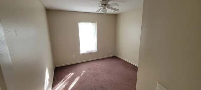 a view of a livingroom with a window