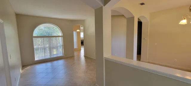 a view of entryway with kitchen