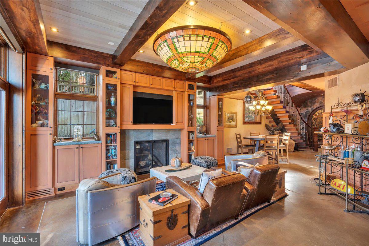 133 Stokes Road Medford Lakes, NJ 08055 - Photo 23 of 57 a living room with fireplace furniture and a large window