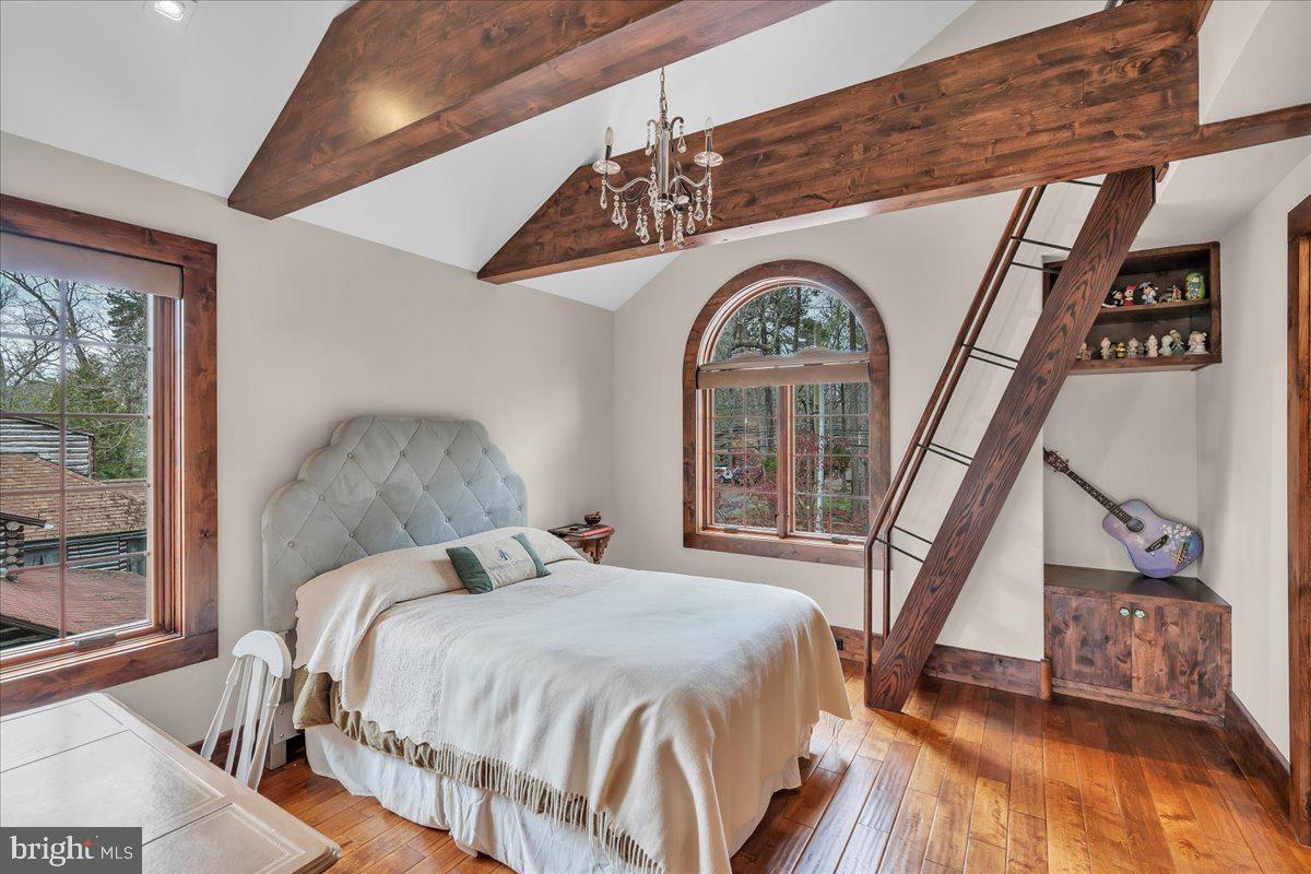 133 Stokes Road Medford Lakes, NJ 08055 - Photo 35 of 57 a bedroom with a bed and a large window