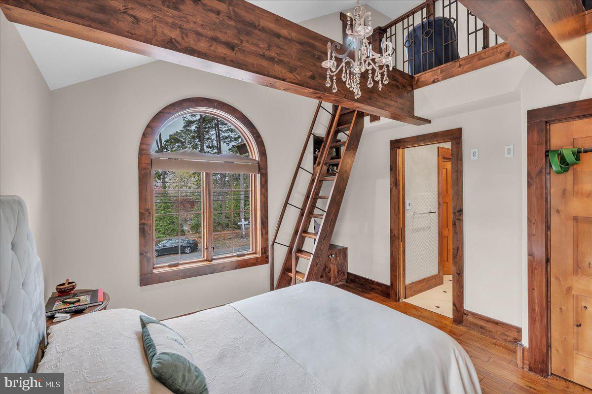 133 Stokes Road Medford Lakes, NJ 08055 - Photo 36 of 57 a bedroom with a bed and a large window