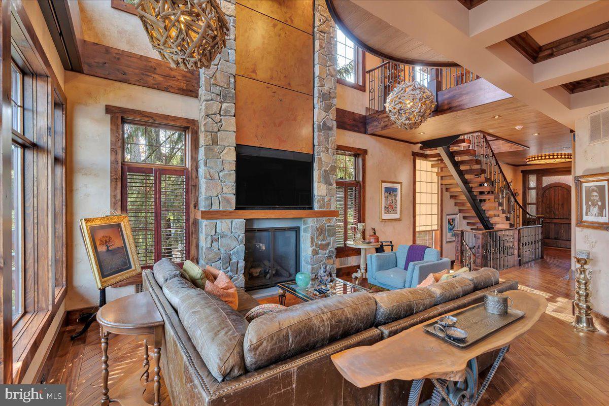 133 Stokes Road Medford Lakes, NJ 08055 - Photo 7 of 57 a living room with fireplace furniture and a flat screen tv