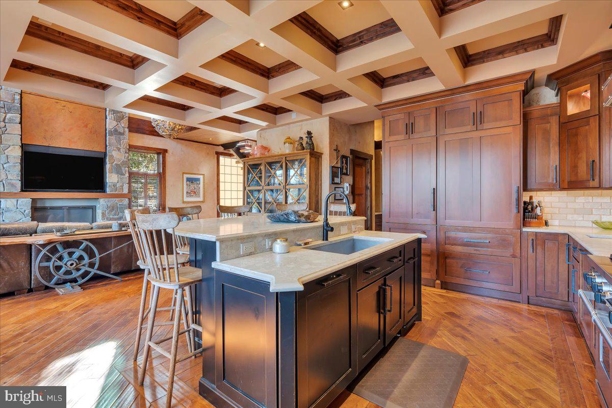133 Stokes Road Medford Lakes, NJ 08055 - Photo 9 of 57 a kitchen with stainless steel appliances granite countertop a stove and a wooden floors