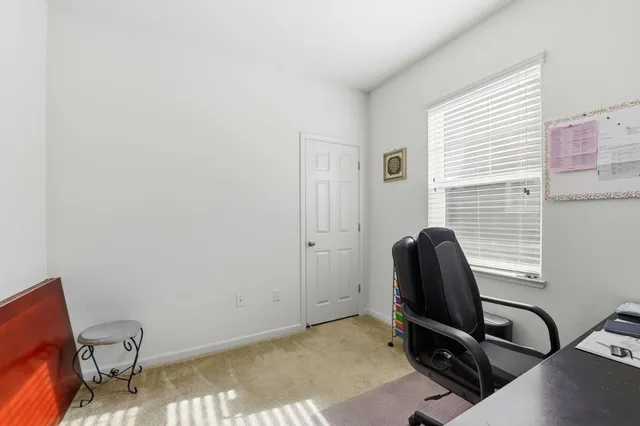 a room with a table and a window