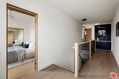 a view of a bedroom from a hallway