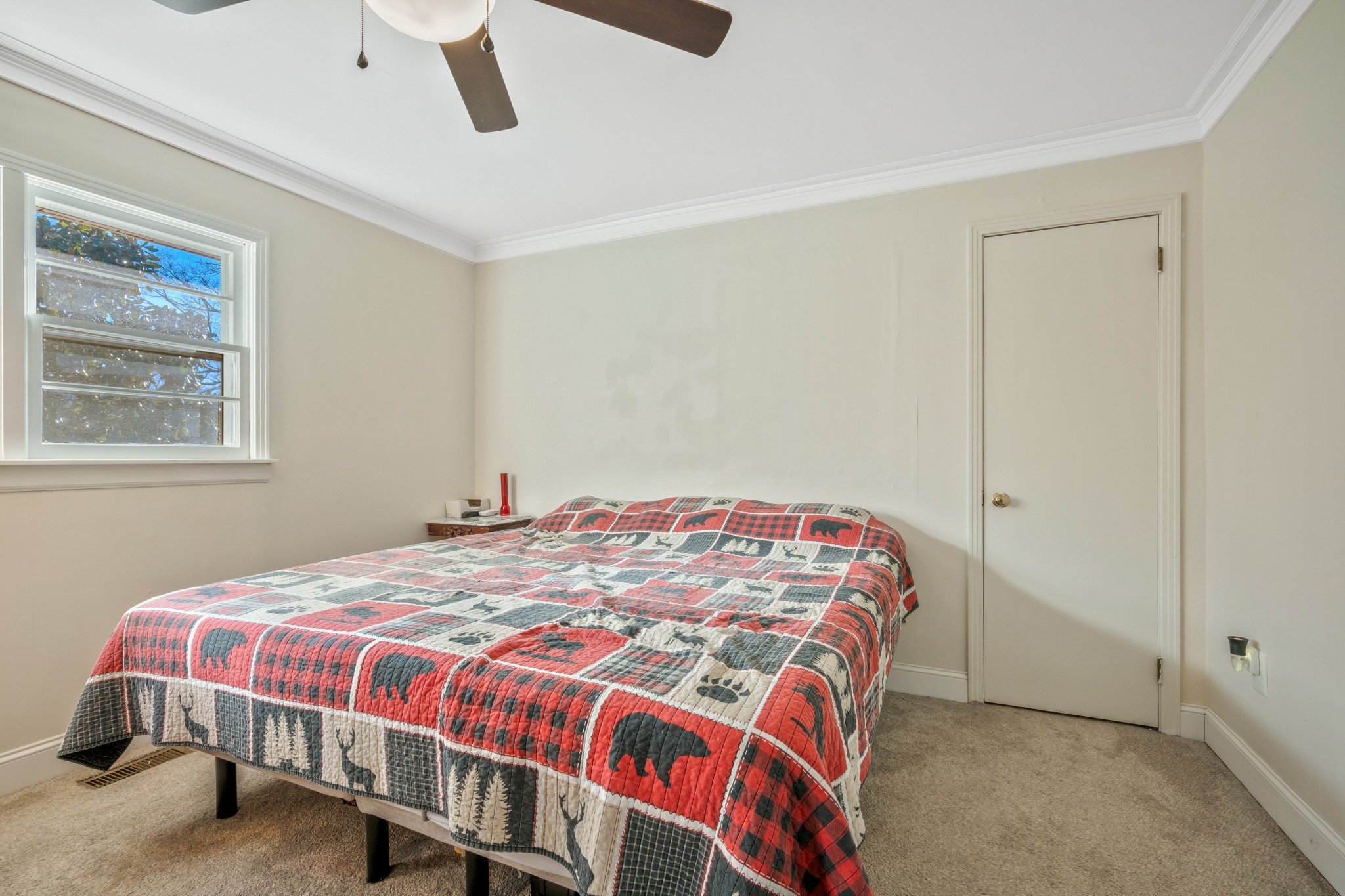 1555 Highway 13 Cunningham, TN 37052 - Photo 18 of 30 a bedroom with a bed and wooden floor