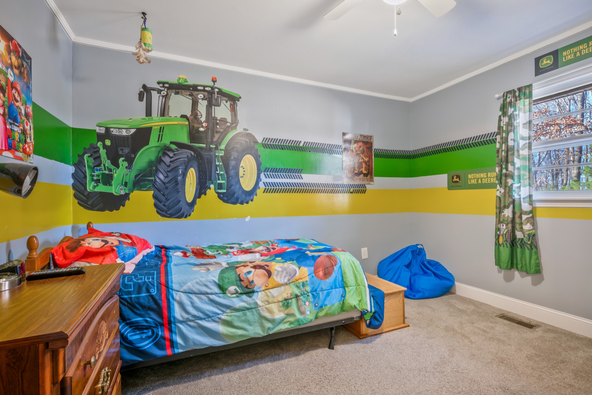 1555 Highway 13 Cunningham, TN 37052 - Photo 19 of 30 a bedroom with a bed a window and dresser