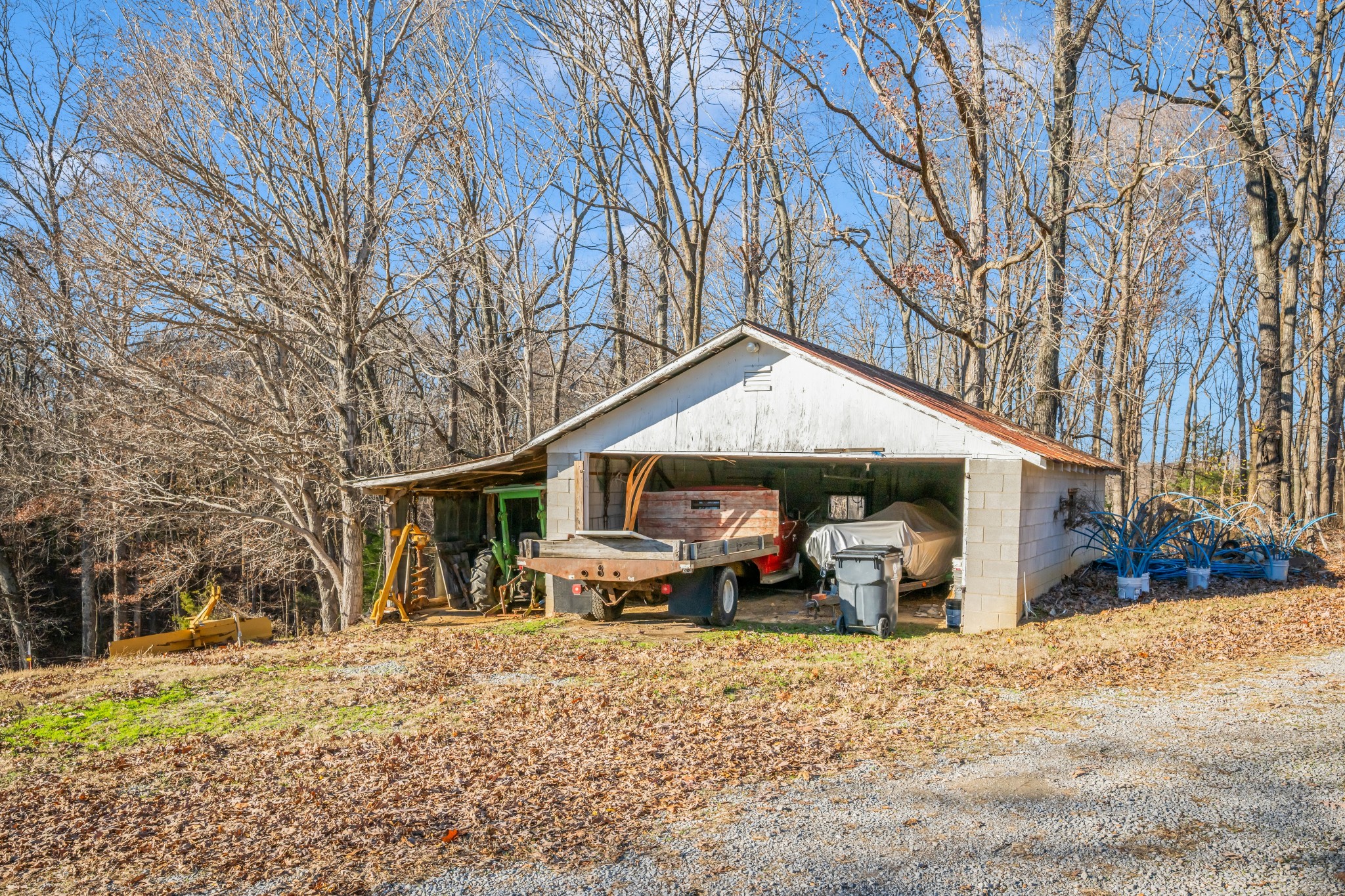 1555 Highway 13 Cunningham, TN 37052 - Photo 29 of 30 a front view of a house with a yard