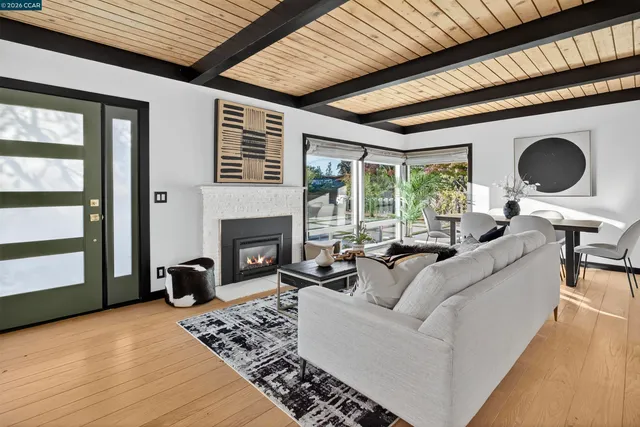 a living room with furniture and a rug