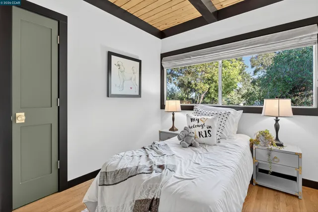 an outdoor space with furniture and umbrella