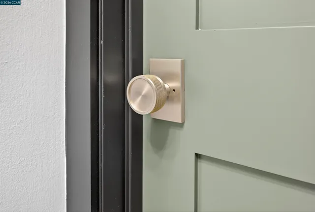 a kitchen with stainless steel appliances a sink and a microwave